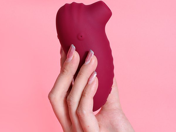 Vibrator mit Saugfunktion und Klitorisstimulation